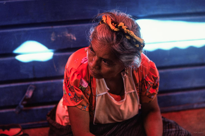 Woman in Red Against Blue Bench, Oaxaca