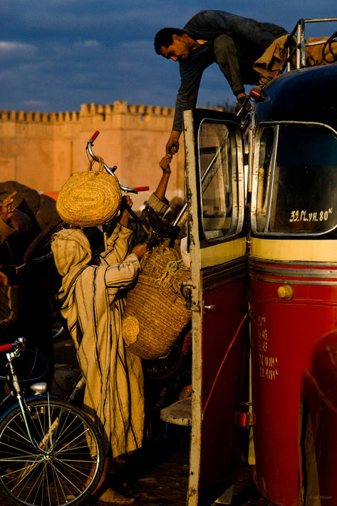 Bus, Man on Top Reaching Down, Marrakech
