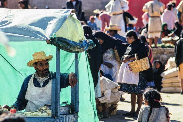 Man in Pushcart, Crowd, San Cristobal