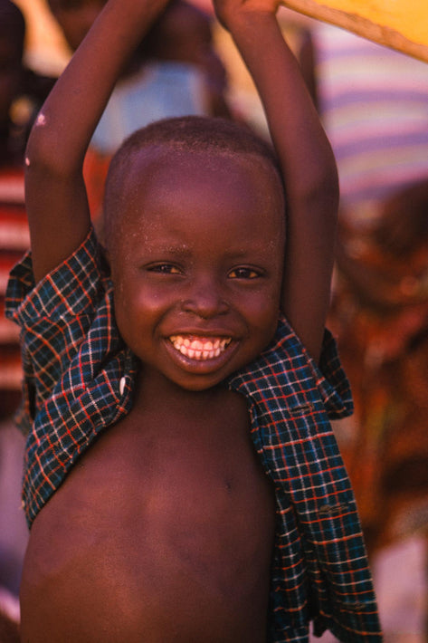 Smiling Child with Plaid Shirt, Senegal