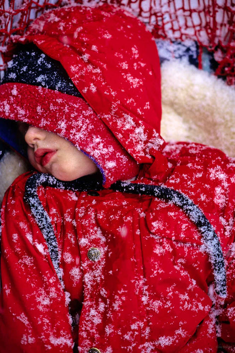 In Snow in Stroller, A More Committed Father would have Taken Her Inside