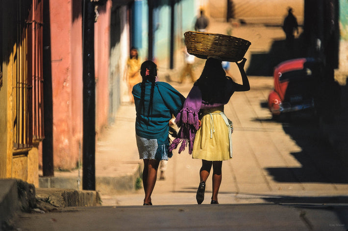 Two Women, One with Basket on Head, San Cristobal