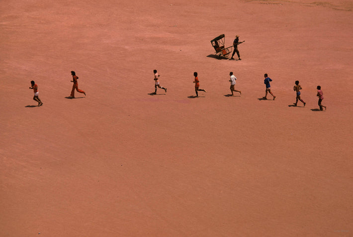 Running Men and Rickshaw, Antananarivo