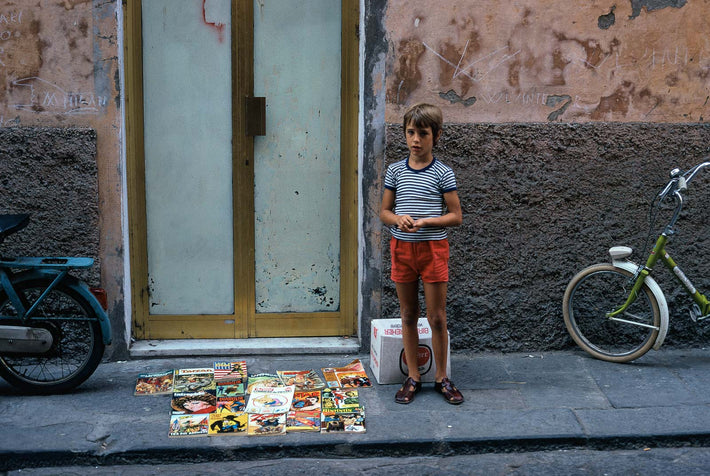 Boy with Comic Books, Orbetello, Italy