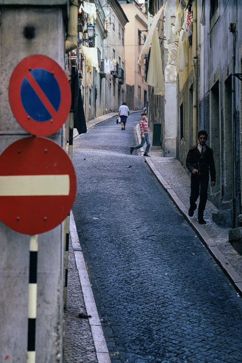 Street with Traffic Signs, Three People, Portugal