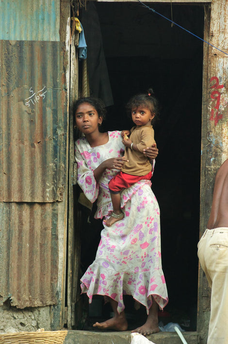 Young Girl Holding Toddler on Hip, Mumbai