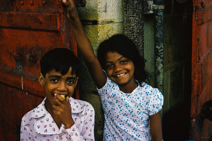 Two Kids, One Eating, One Smiling, Mauritius