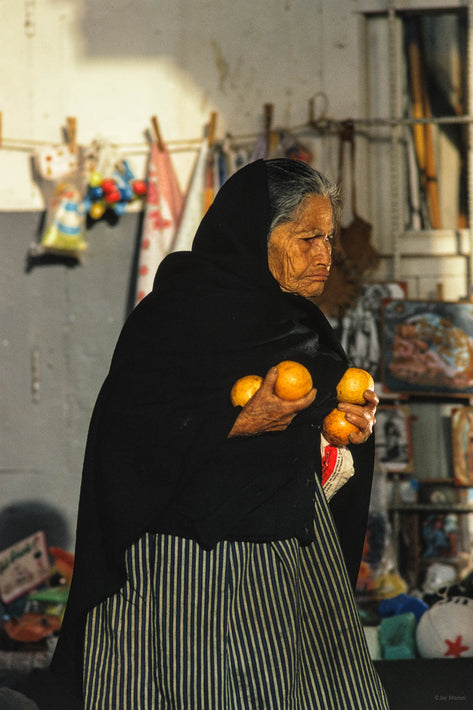 Woman with Oranges, San Cristobal