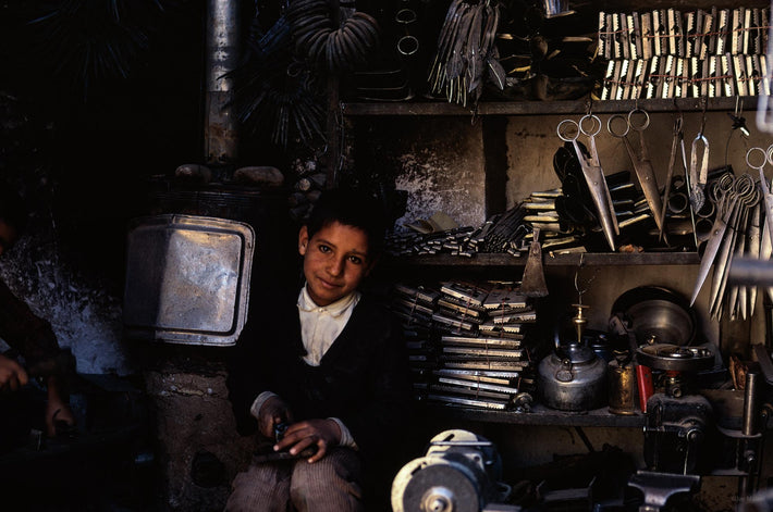 Young Boy in Shop Looking at Me, Iran
