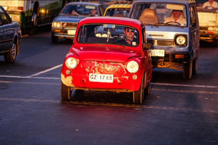 Man in Tiny Red Car, Chile