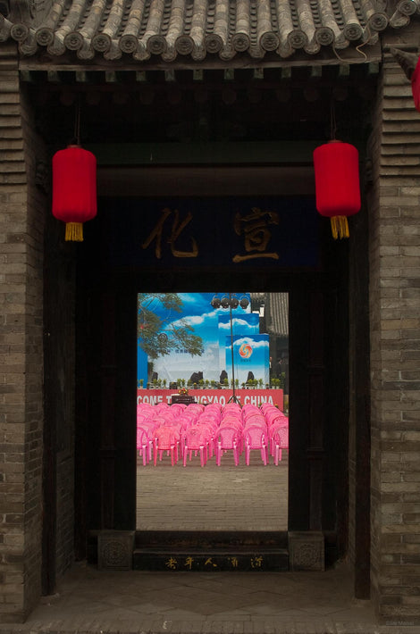 Looking Through Old Door at Pink Chairs, Pingyao