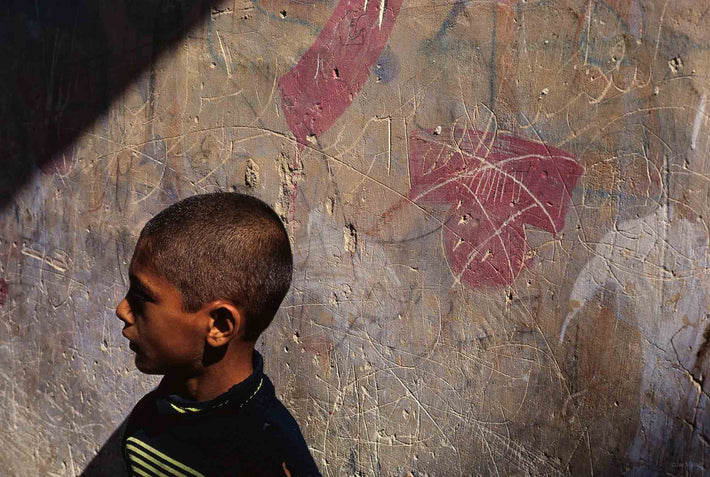 Boy's Head Against Graffiti, Iran