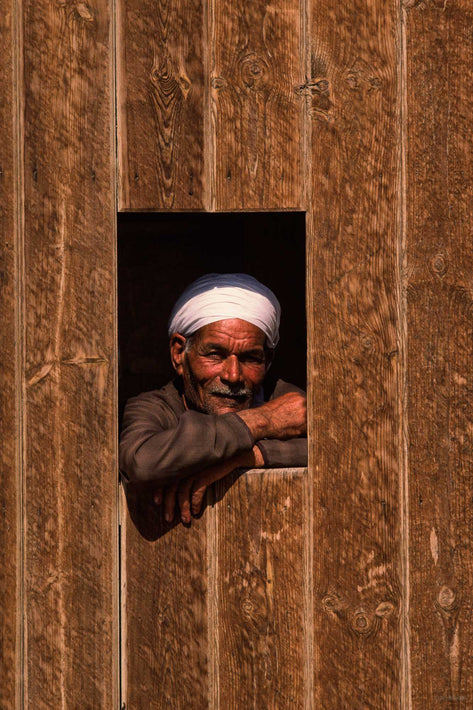 Man in Window of Wood Wall, Egypt