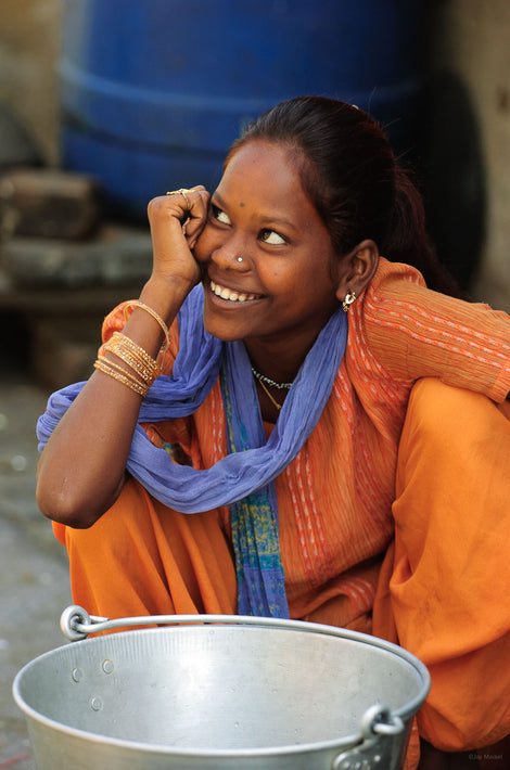 Squatting, Smiling Young Girl with Pot, Mumbai