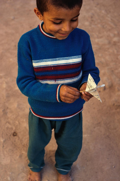 Boy with Paper Airplane, Iran