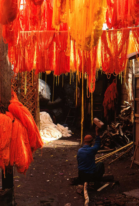 Man with Raised Hammer, Orange Skeins Overhead, Marrakech