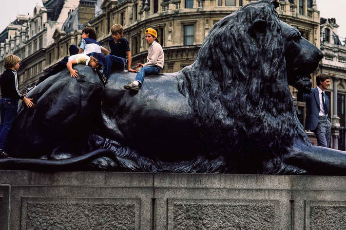 Kids on Huge Lion Statue, London