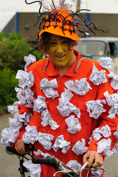 Man in Red Dotted with Papers, Seattle