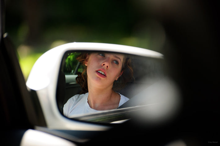 Amanda in Rear View Mirror (Still Stuck in Back Seat)