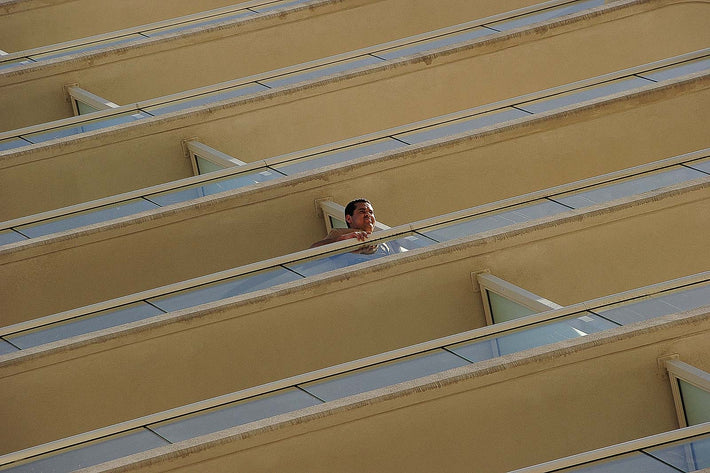 Man Looking over Balcony, Las Vegas
