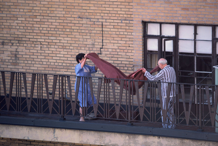 Couple with Blanket on Balcony, NYC