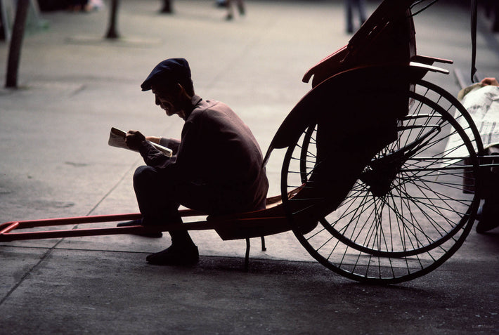 Rickshaw Man Reading, Hong Kong