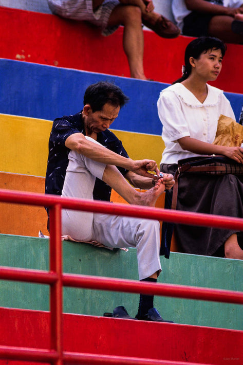 Man Clipping Toe Nails, Hong Kong