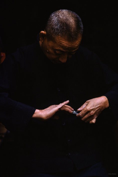 Man Clipping Nails, Hong Kong